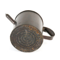 Aristotle&#039;s watering pot. A small tin watering can with small holes perforated in the base.