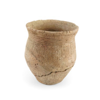 Ceramic beaker. A pot which slightly flares out at the middle, before narrowing at the neck and flaring out toward the rim. It is decorated with dotted vertical, horizontal and chevron lines.