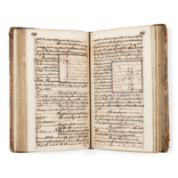Notebook. An open manuscript book with diagrams of the motion of projectiles and explanatory text.