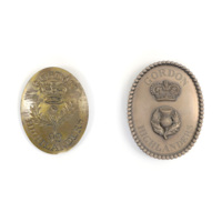 Belt plates. Two oval plates made of copper alloy, inscribed Gordon Highlanders and decorated with a thistle and crown.
