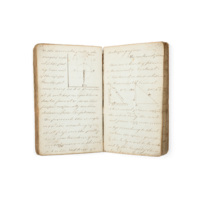 Notebook. An open manuscript book with diagrams of pulleys and explanatory text.
