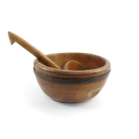 Brose cap and ladle. A bowl carved out of a single piece of wood, with an iron band around it, and a wooden ladle.