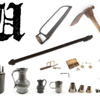 A large ornate printed capital letter W with a saw, adze, axe head, weights, measures and scales.