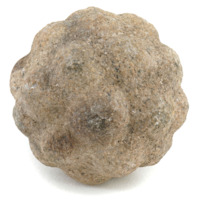 Carved stone ball. Roughly the size of a soft ball. Beige stone ball with 30 large round knobs arranged irregularly.
