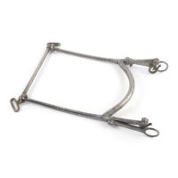 Horse bit. A roughly square shaped arrangement of steel rods with loops and hooks for attaching harnesses.