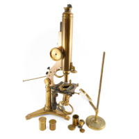 Microscope. A brass microscope with additional lenses for magnification and directing light onto a mirror to illuminate the specimen.