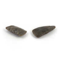 Flint axe and adze heads. Made of flint with sharpened edges, the adze rough and rectangular, the axe smooth and tapered.