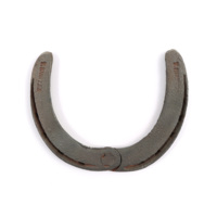 Adjustable horseshoe. An iron horseshoe with a hinge in the middle.