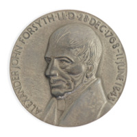Medal. A grey metal medal with a three-quarter profile of a short haired, elderly man and the inscription Alexander John Forsyth LL D 28 Dec 1768 - 11 June 1843.