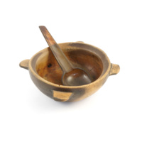 Bassie and spoon. A horn spoon in a bowl with four flat handles carved from a single piece of wood.