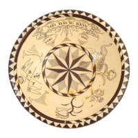 Dairy bowl. A large cream coloured ceramic bowl with depressed brown decoration inside. The surface has a shiny glaze. The decoration consists of an eight pointed star inside a ring on the base, a peacock, flowers, an insignia consisting of a pair of crossed flags, an anchor, a pair of crosses swords a crown and the initials V R; and the inscription Mrs. David Rew, FEBY 4th 1882.