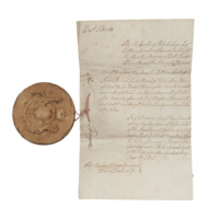 A document headed East Florida with a large circular wax seal tied to it.