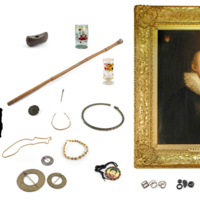 A large printed capital letter T with a portrait in a gilded frame, trinkets, glass goblets, a stick, an axe, mace and spear head, a wooden panel and a document seal.