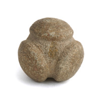 Carved stone ball. Roughly the size of a tennis ball. Beige stone ball with four large, flat circular knobs equidistant from each other. Three of the knobs have different spiral and rose like designs cut on them.