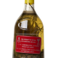 Image of bottle of medicinal wine containing a snake and including label.