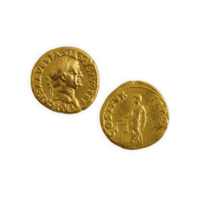 Aureus. Small gold coin about the size of a 1 pence piece. On one side is the profile of an emperor with laurels and the inscription IMPCAESSARVESPASIANVSAUGTRP. On the other side is a female figure wearing a cap and toga, holding a set of scales and a staff, with the inscription  COSITER TRPO.